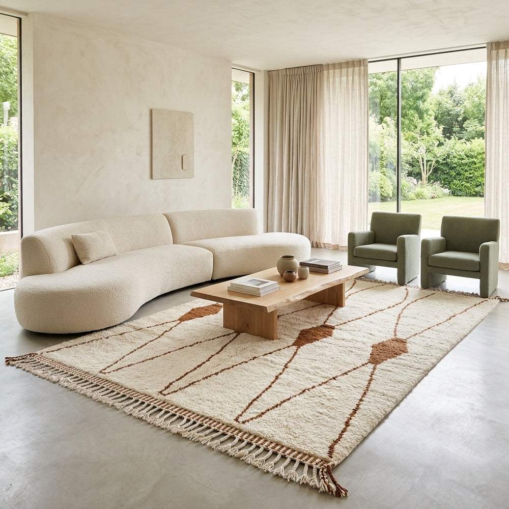 Beige and brown Moroccan wool rug with geometric design, handmade by Berber artisans using natural wool
