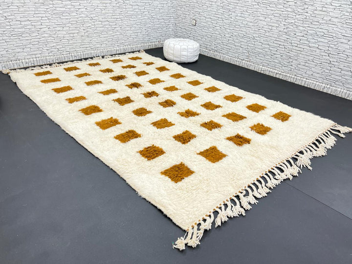 Beige and mustard handmade Moroccan wool rug with checker square pattern