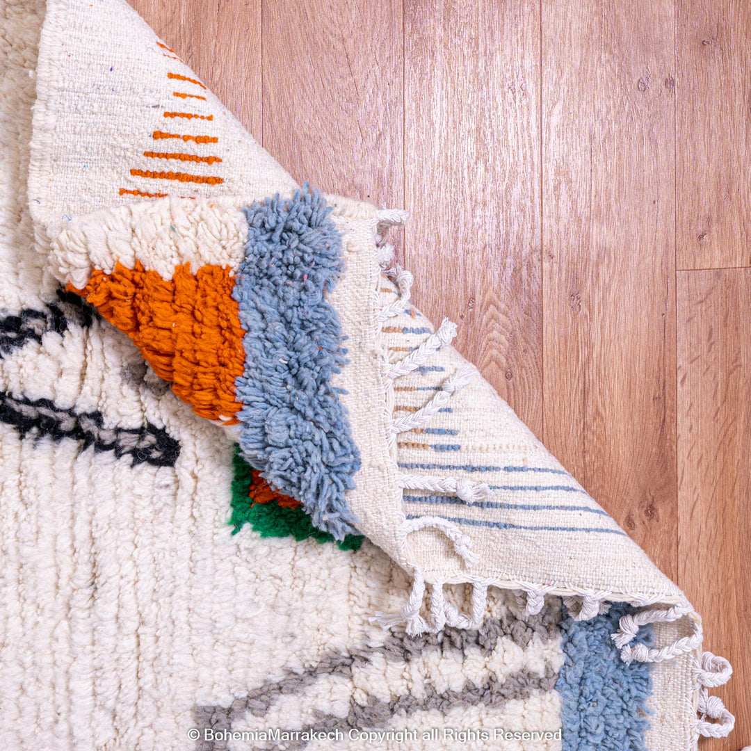 Colorful Moroccan Berber rug with multicolored tribal motifs – handmade wool