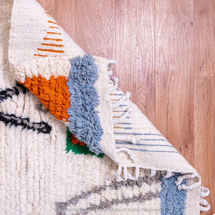 Colorful Moroccan Berber rug with multicolored tribal motifs – handmade wool
