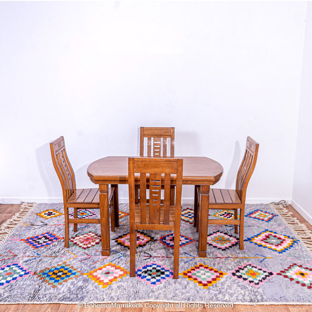 Colorful diamond Moroccan wool rug with grey shag background