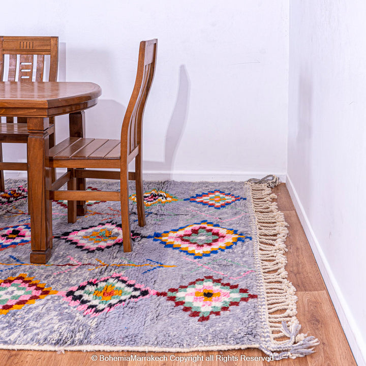 Colorful diamond Moroccan wool rug with grey shag background