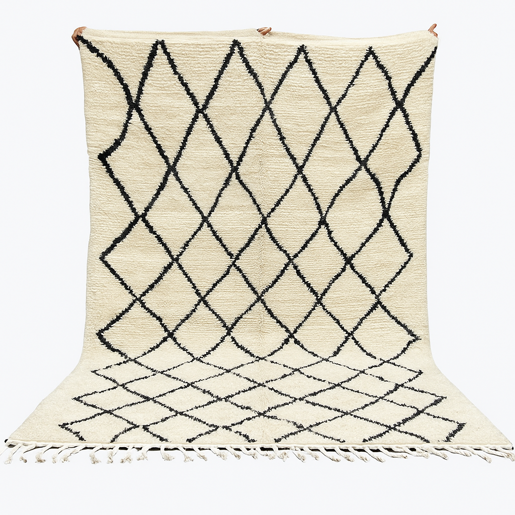 Handwoven Beni Ourain Moroccan wool rug with black diamond pattern on ivory background