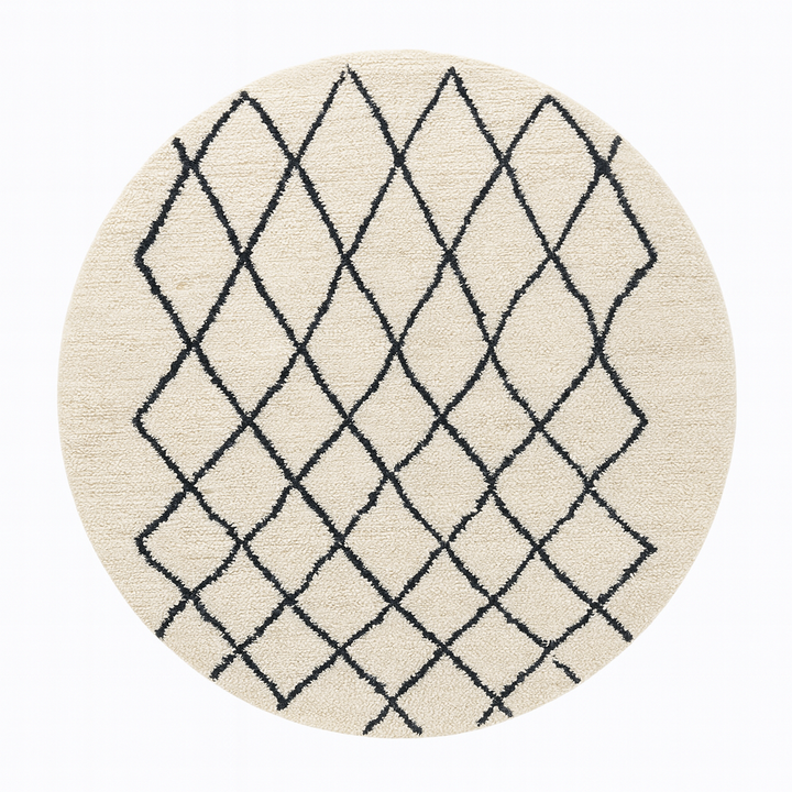 Handmade Beni Ourain Moroccan wool rug with black diamond lines on a natural white wool background.