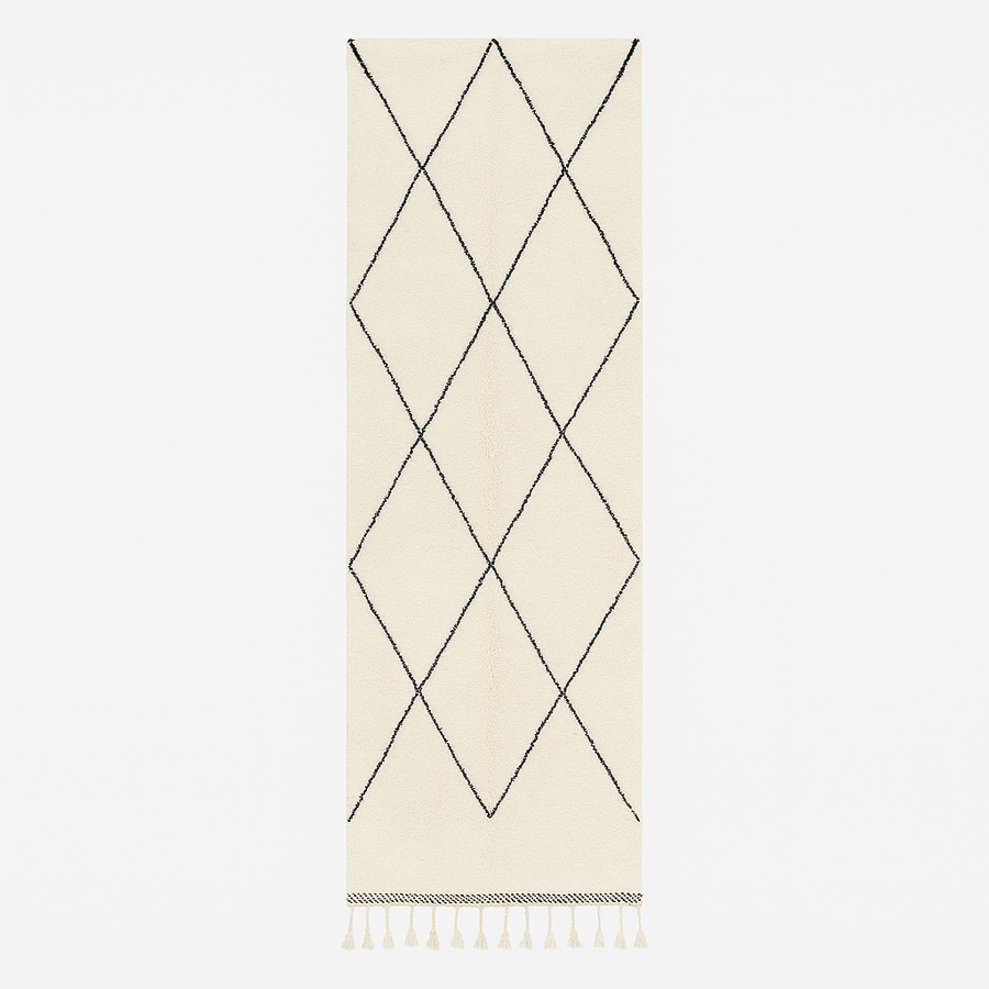 Black and white Beni Ourain Moroccan wool runner rug with diamond pattern and fringed edges