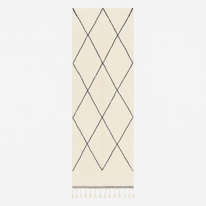 Black and white Beni Ourain Moroccan wool runner rug with diamond pattern and fringed edges