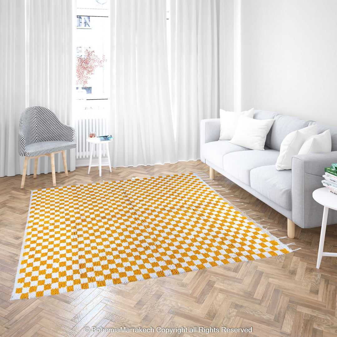 Handwoven Moroccan rug in yellow and white checkerboard pattern, crafted from soft wool