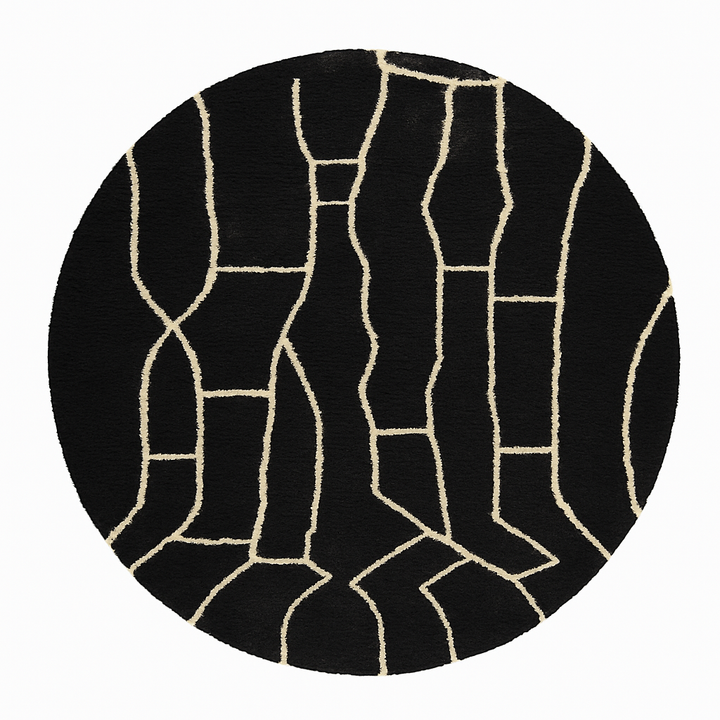 Round black Moroccan wool rug with beige abstract line design.