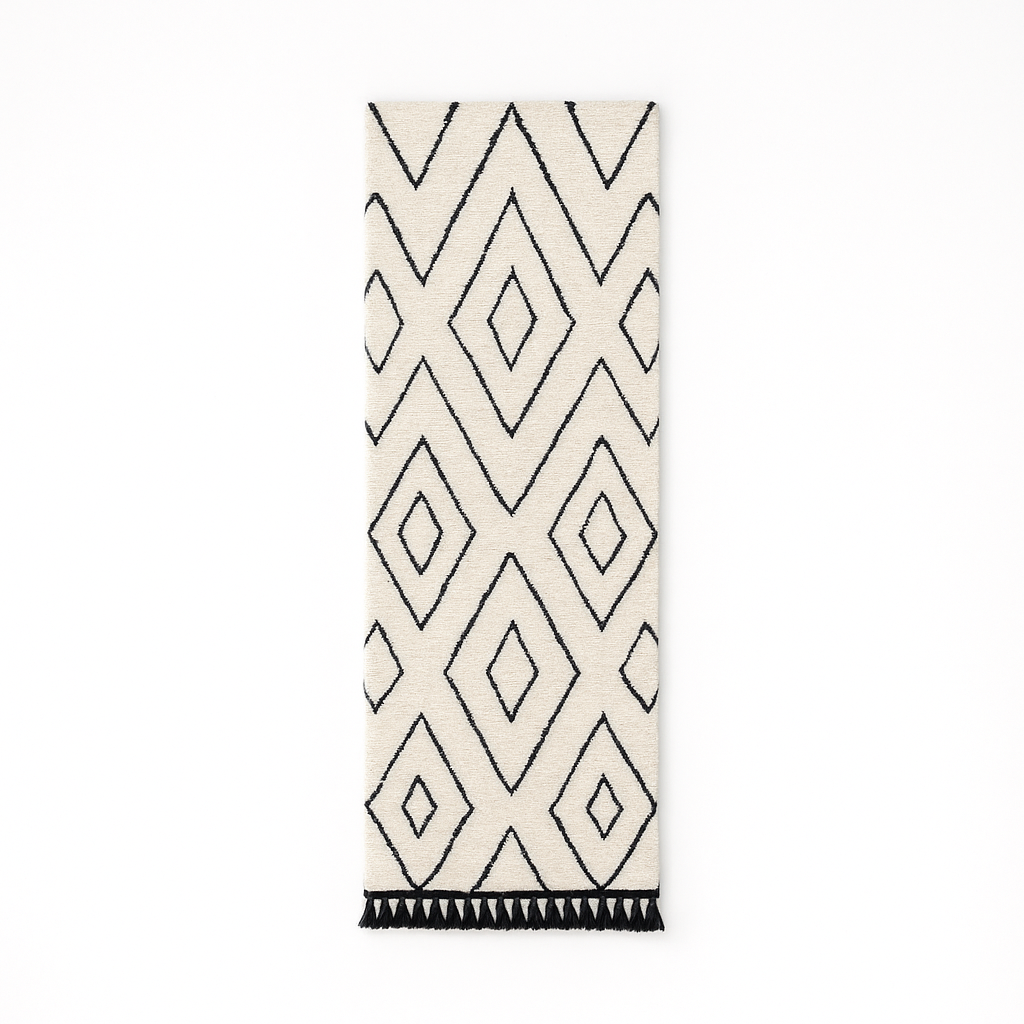 Black and white Moroccan runner rug with diamond geometric pattern made of handmade wool and black fringed ends