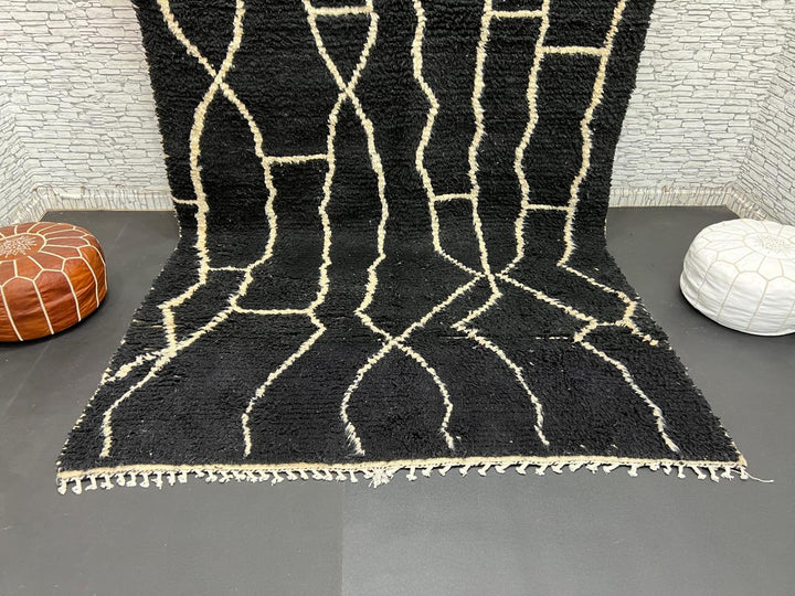 Black and white Moroccan wool rug with modern geometric line design