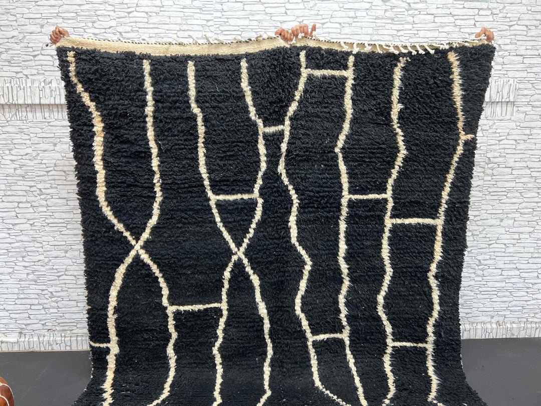 Black and white Moroccan wool rug with modern geometric line design