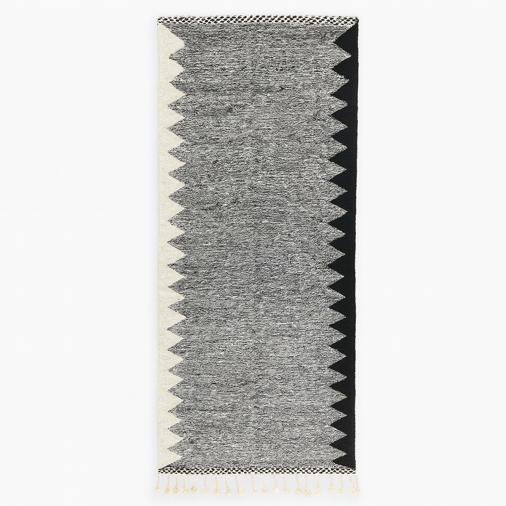Handmade black and white Moroccan kilim runner rug with bold zigzag geometric pattern and flatwoven wool texture
