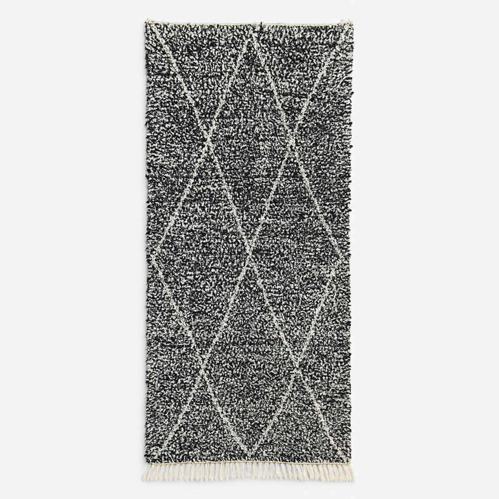 Handmade black and white Moroccan runner rug with diamond lattice pattern in natural wool, Beni Ourain style shag runner.