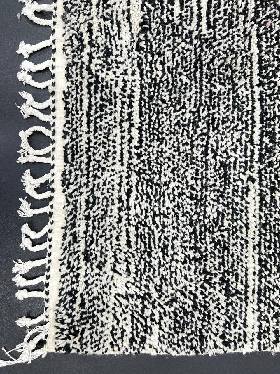 Black and white Moroccan wool runner rug with handmade shag texture and Berber woven pattern, modern boho hallway runner carpet