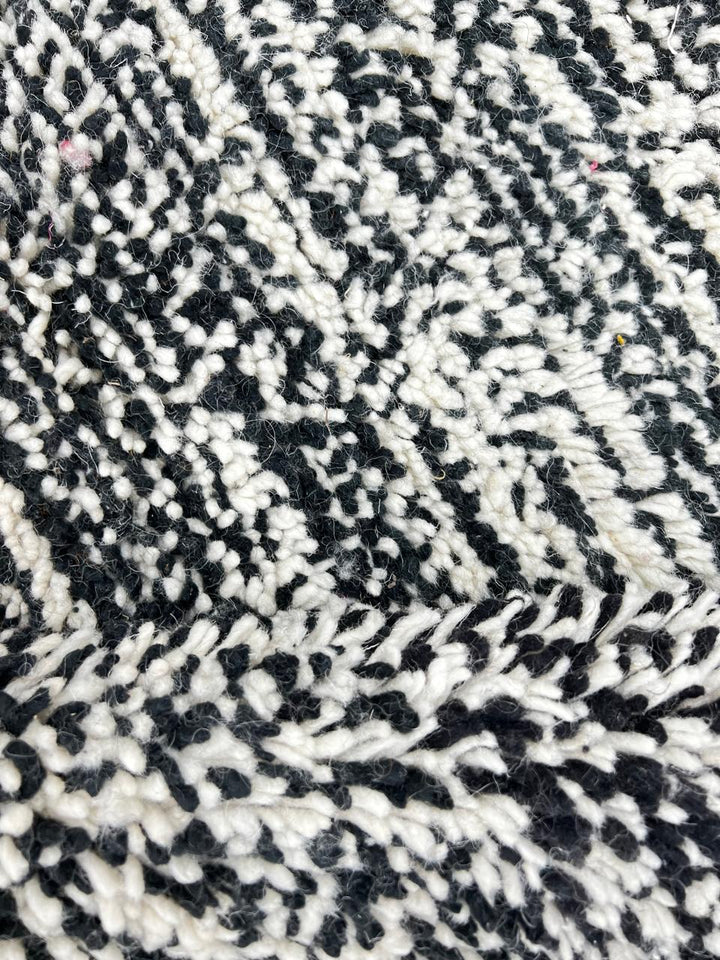Black and white Moroccan wool runner rug with handmade shag texture and Berber woven pattern, modern boho hallway runner carpet