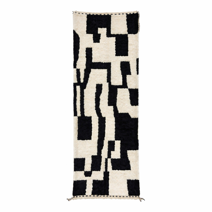 Black and white Moroccan wool runner rug with abstract Berber geometric pattern