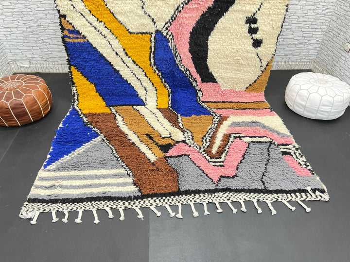 Colorful handmade Moroccan wool rug with abstract geometric pattern