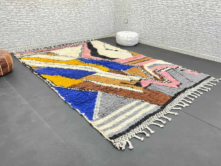 Colorful handmade Moroccan wool rug with abstract geometric pattern
