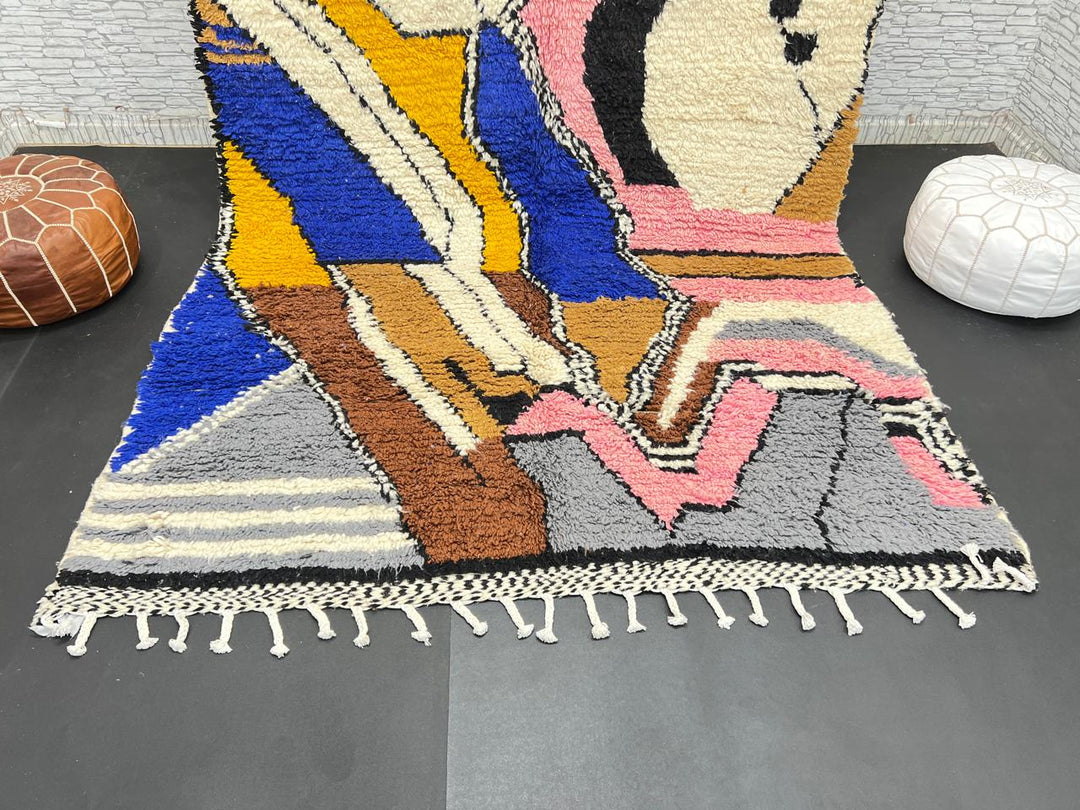 Colorful handmade Moroccan wool rug with abstract geometric pattern