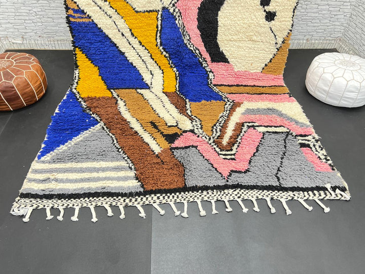 Colorful handmade Moroccan wool rug with abstract geometric pattern
