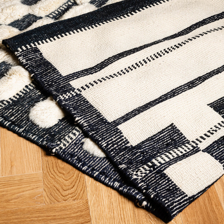 Black and White Checkered Moroccan Rug with Wool Stripe Design