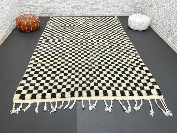 Handwoven black and white Moroccan wool rug with checkerboard pattern