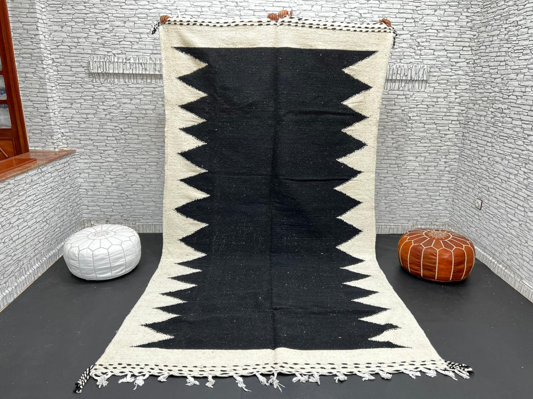 Handwoven Moroccan flatweave rug in black and white – geometric zigzag wool Berber carpet handmade in Morocco
