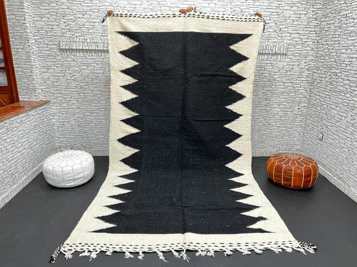 Handwoven Moroccan flatweave rug in black and white – geometric zigzag wool Berber carpet handmade in Morocco