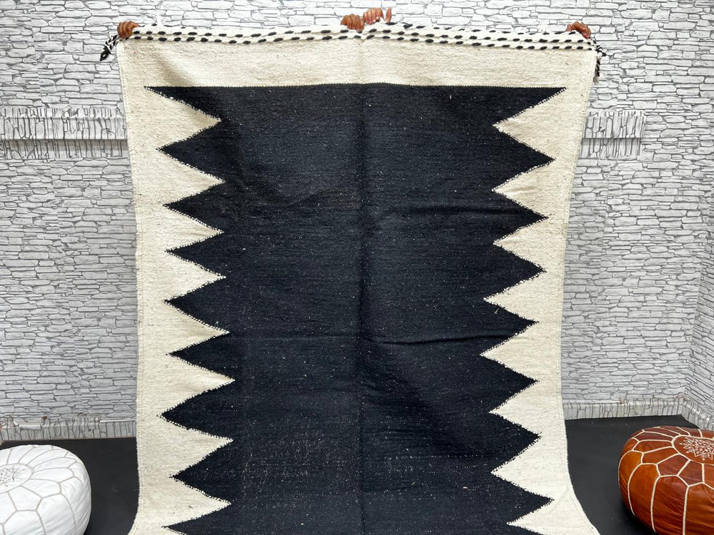 Handwoven Moroccan flatweave rug in black and white – geometric zigzag wool Berber carpet handmade in Morocco
