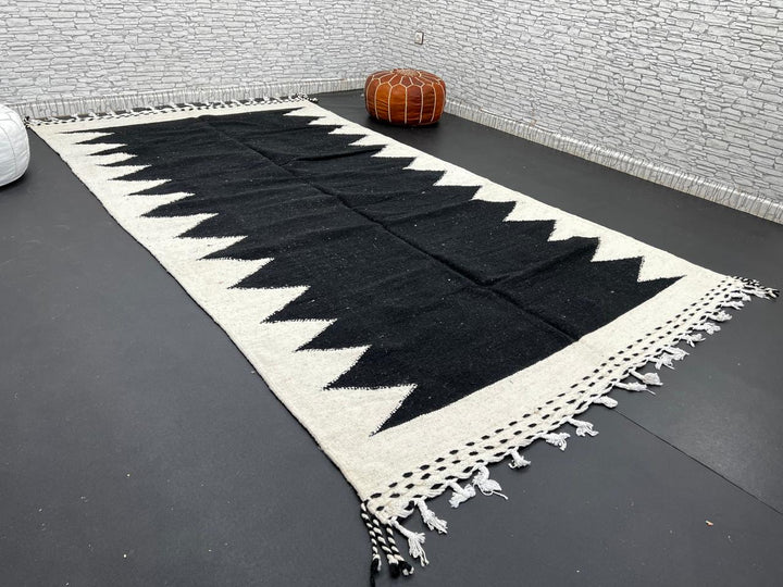 Handwoven Moroccan flatweave rug in black and white – geometric zigzag wool Berber carpet handmade in Morocco