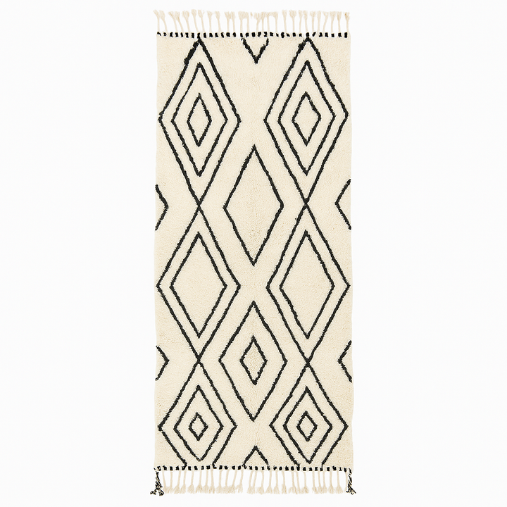 Black and white Moroccan wool runner rug with Beni Ourain diamond pattern and fringed edges