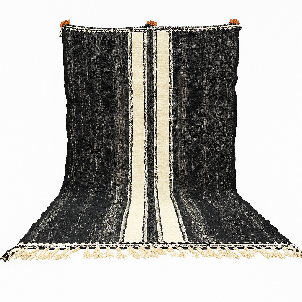 Black and white Moroccan wool rug with vertical stripe design, handmade by Berber artisans