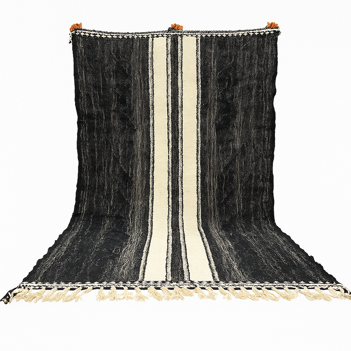 Black and white Moroccan wool rug with vertical stripe design, handmade by Berber artisans