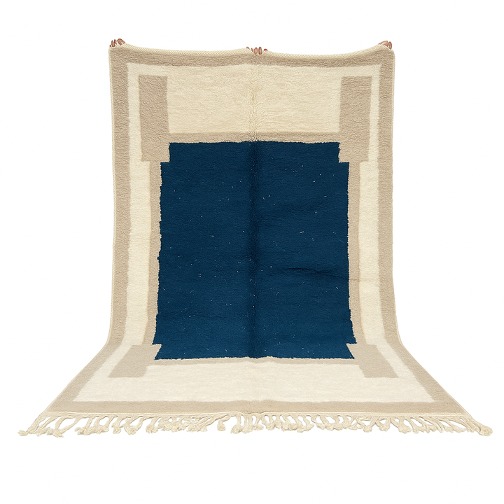 Blue beige Moroccan wool rug with deep blue geometric center