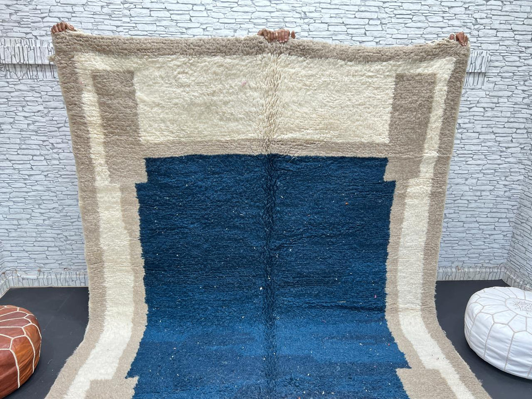 Blue beige Moroccan wool rug with deep blue geometric center