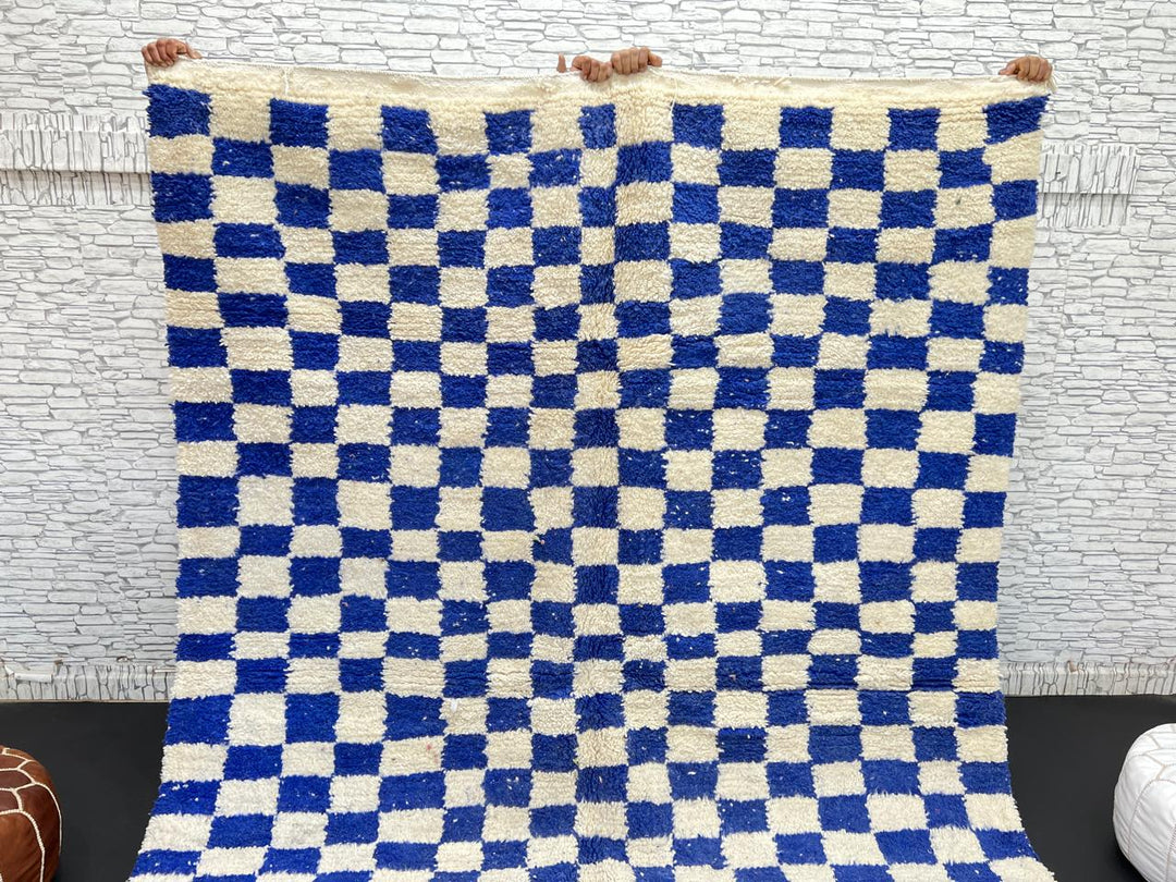 Handwoven Moroccan wool rug with blue and cream checkered design
