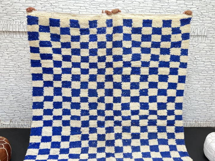 Handwoven Moroccan wool rug with blue and cream checkered design