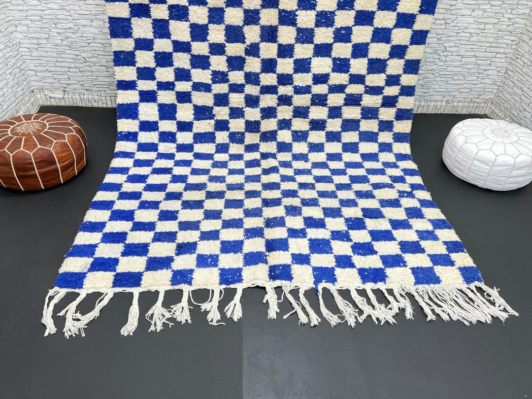 Handwoven Moroccan wool rug with blue and cream checkered design