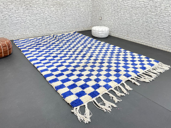 Handwoven Moroccan wool rug with blue and cream checkered design