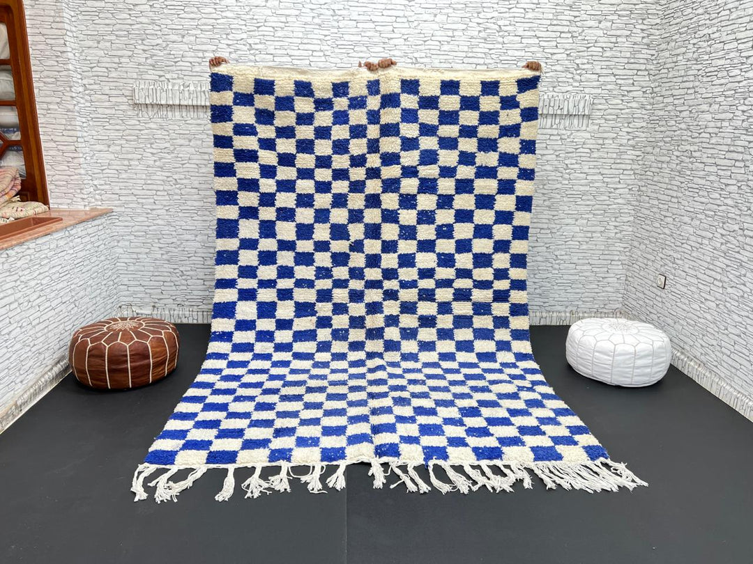 Handwoven Moroccan wool rug with blue and cream checkered design