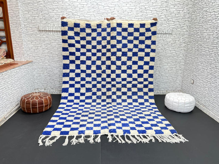 Handwoven Moroccan wool rug with blue and cream checkered design