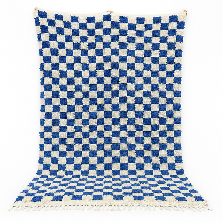 Handwoven blue and cream Moroccan wool rug with checkered design