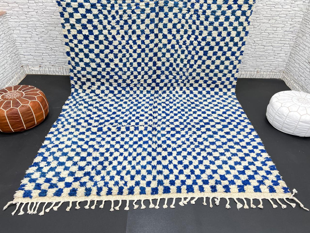 Handwoven blue and cream Moroccan wool rug with checkered design