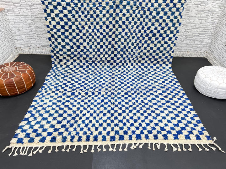 Handwoven blue and cream Moroccan wool rug with checkered design