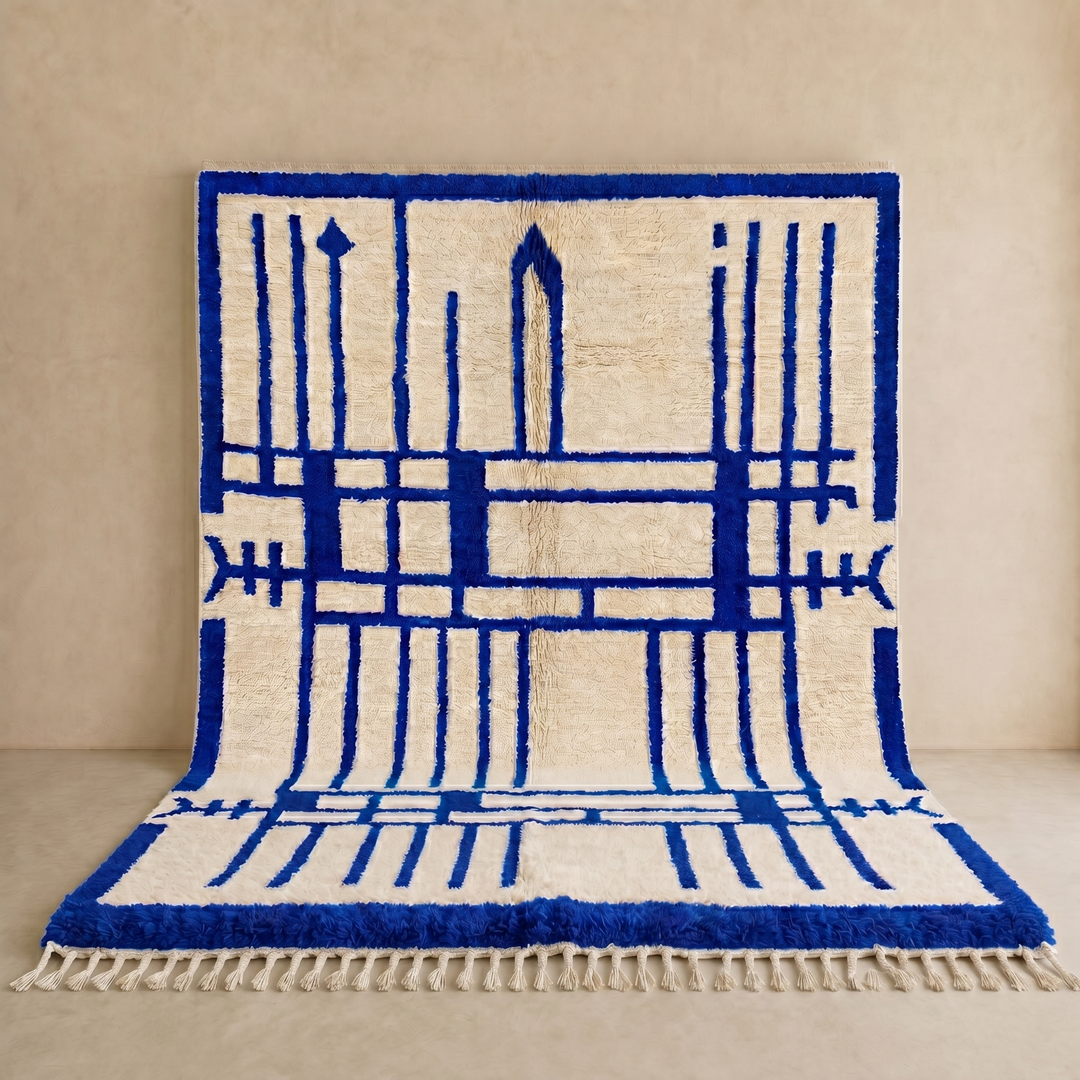 Handmade Moroccan wool rug with blue geometric Berber design. Soft plush texture, modern style, and artisan crafted.