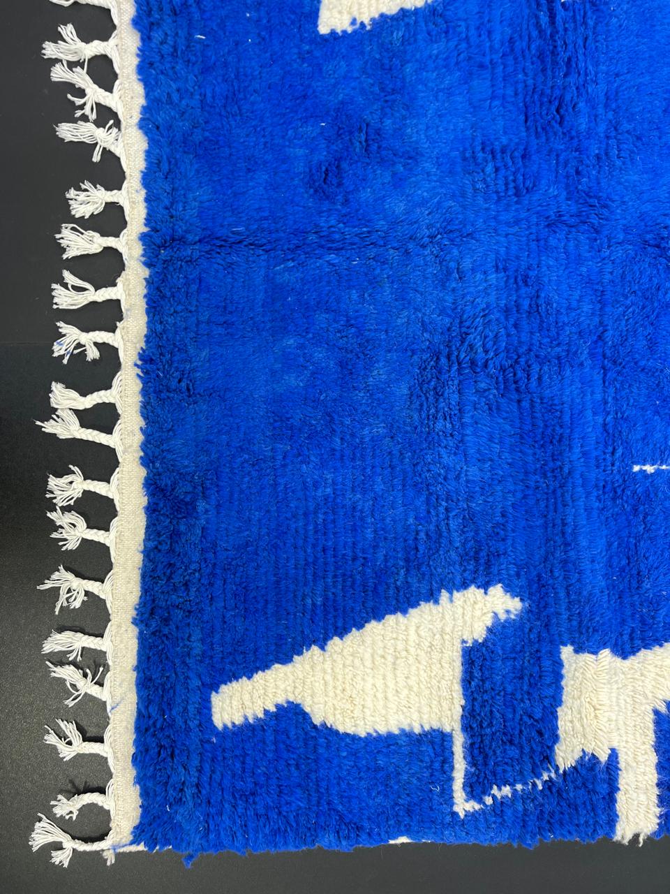 Handwoven blue Moroccan wool runner rug with abstract white line pattern