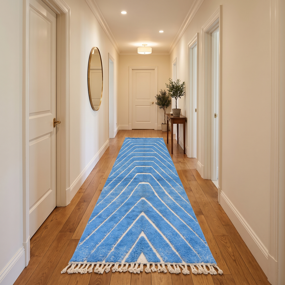 Blue Moroccan runner rug with carved ivory geometric lines, handmade wool