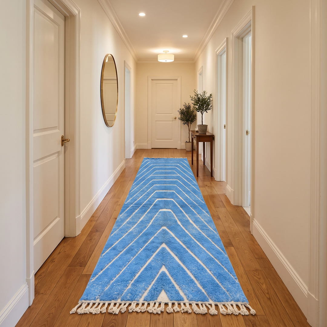 Blue Moroccan runner rug with carved ivory geometric lines, handmade wool