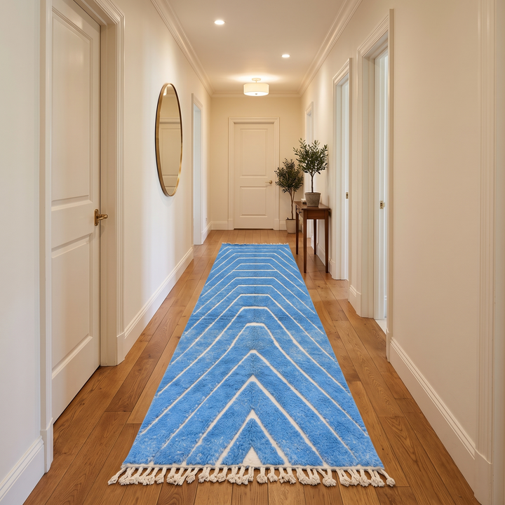 Blue Moroccan runner rug with carved ivory geometric lines, handmade wool