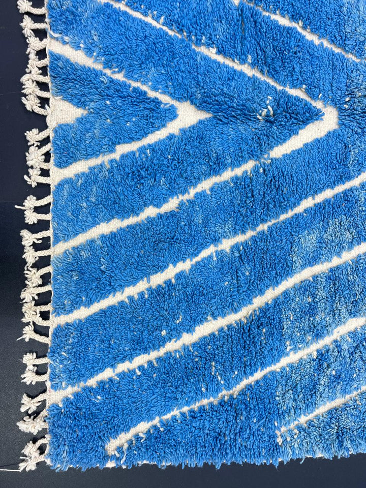 Blue Moroccan runner rug with carved ivory geometric lines, handmade wool